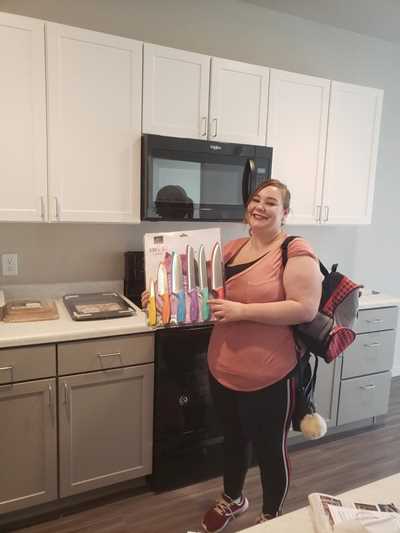 April in her apartment