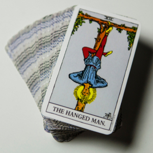 The Hanged Man Card appearing in a Tarot Reading represents deep personal and spiritual growth.
