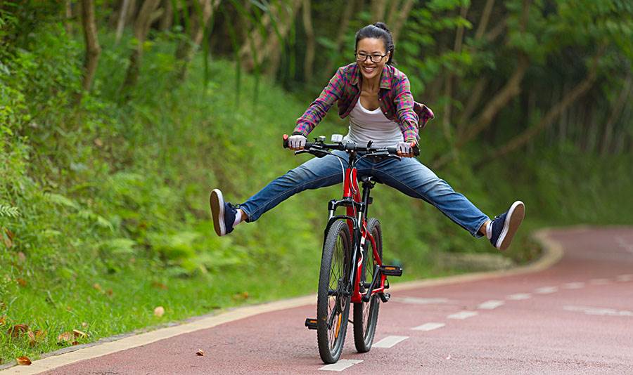 woman having fun cycling