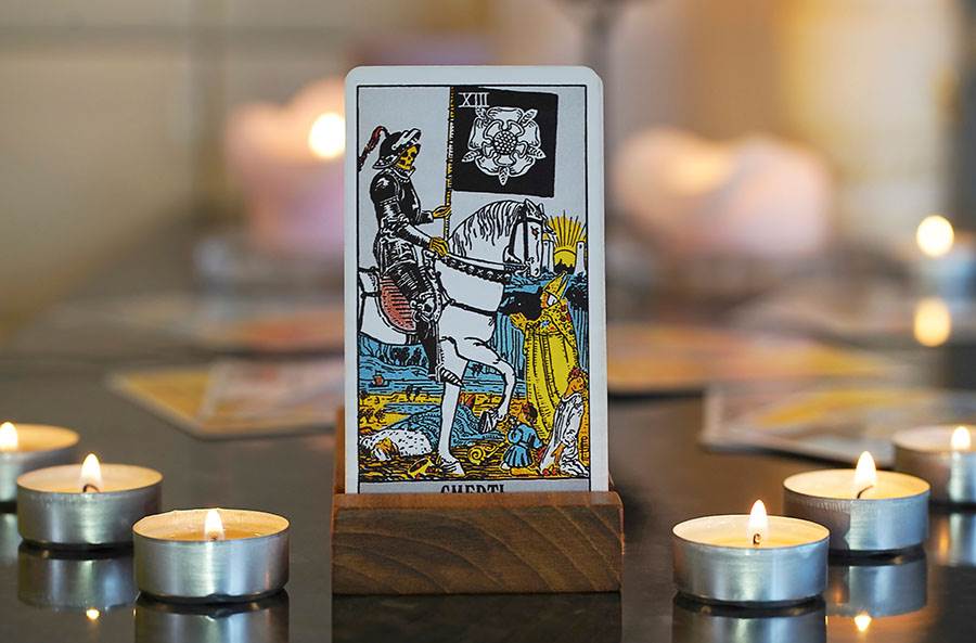Death tarot card and candles