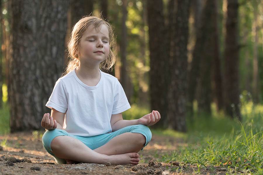 Meditating child