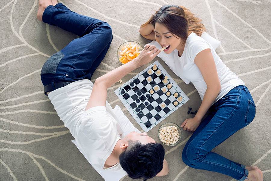 couple playing a board game